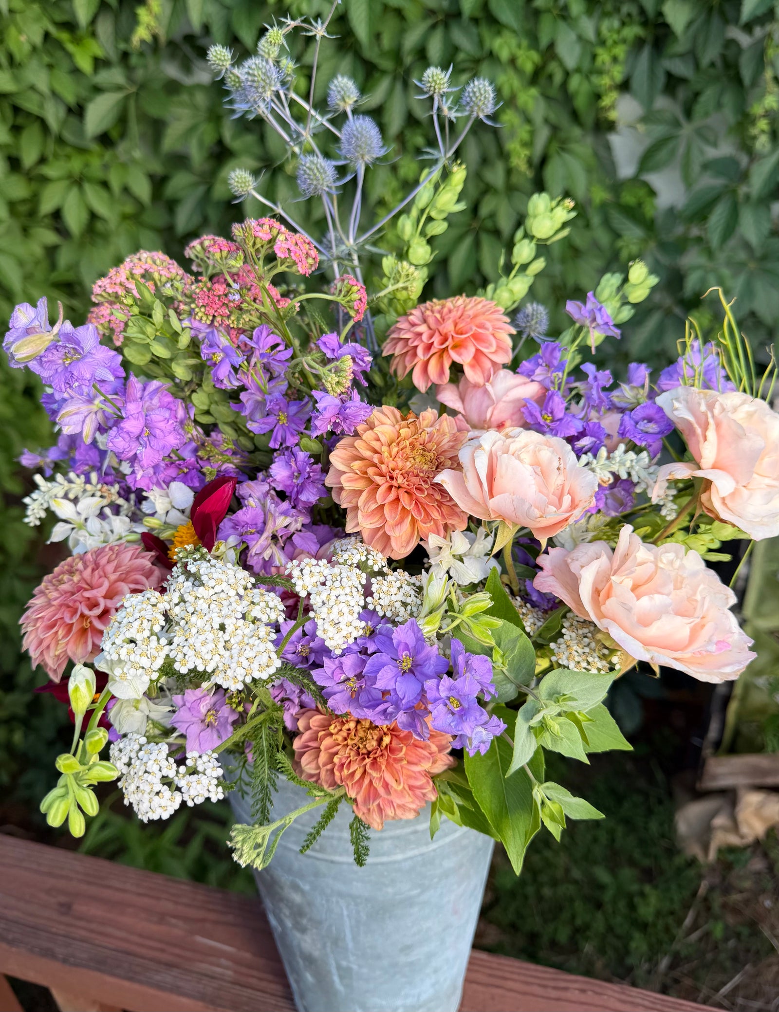 A wild, romantic bridal bloom bucket from The May Garden in Taylorsville, GA